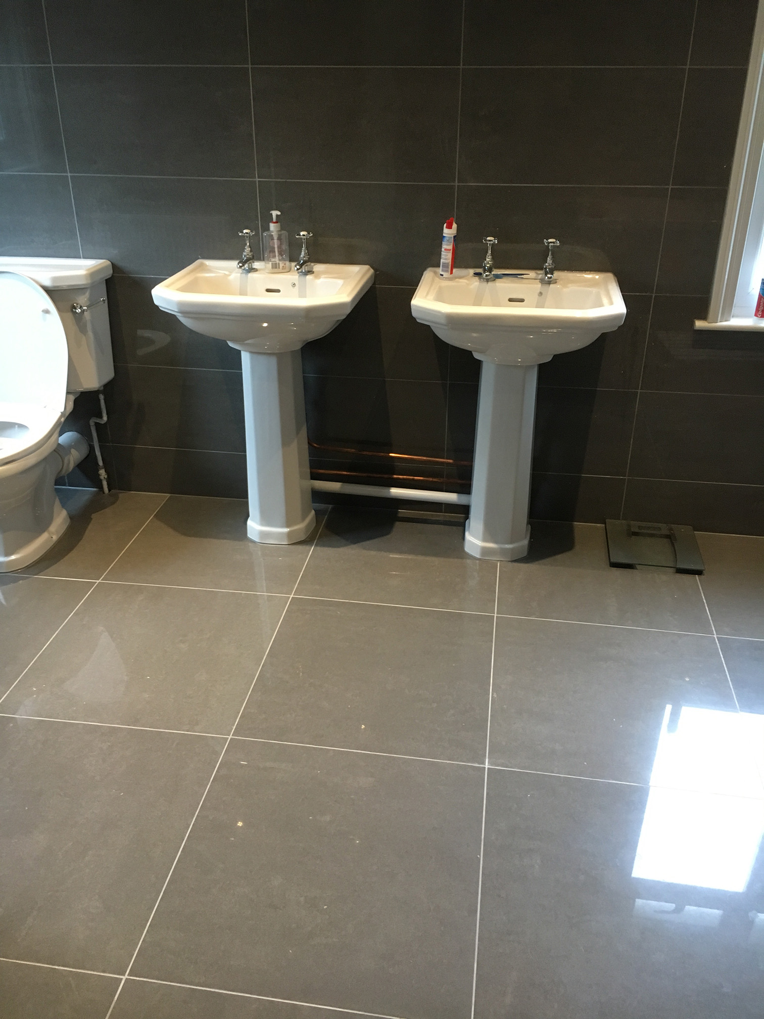 Boxing over pipework before tiling